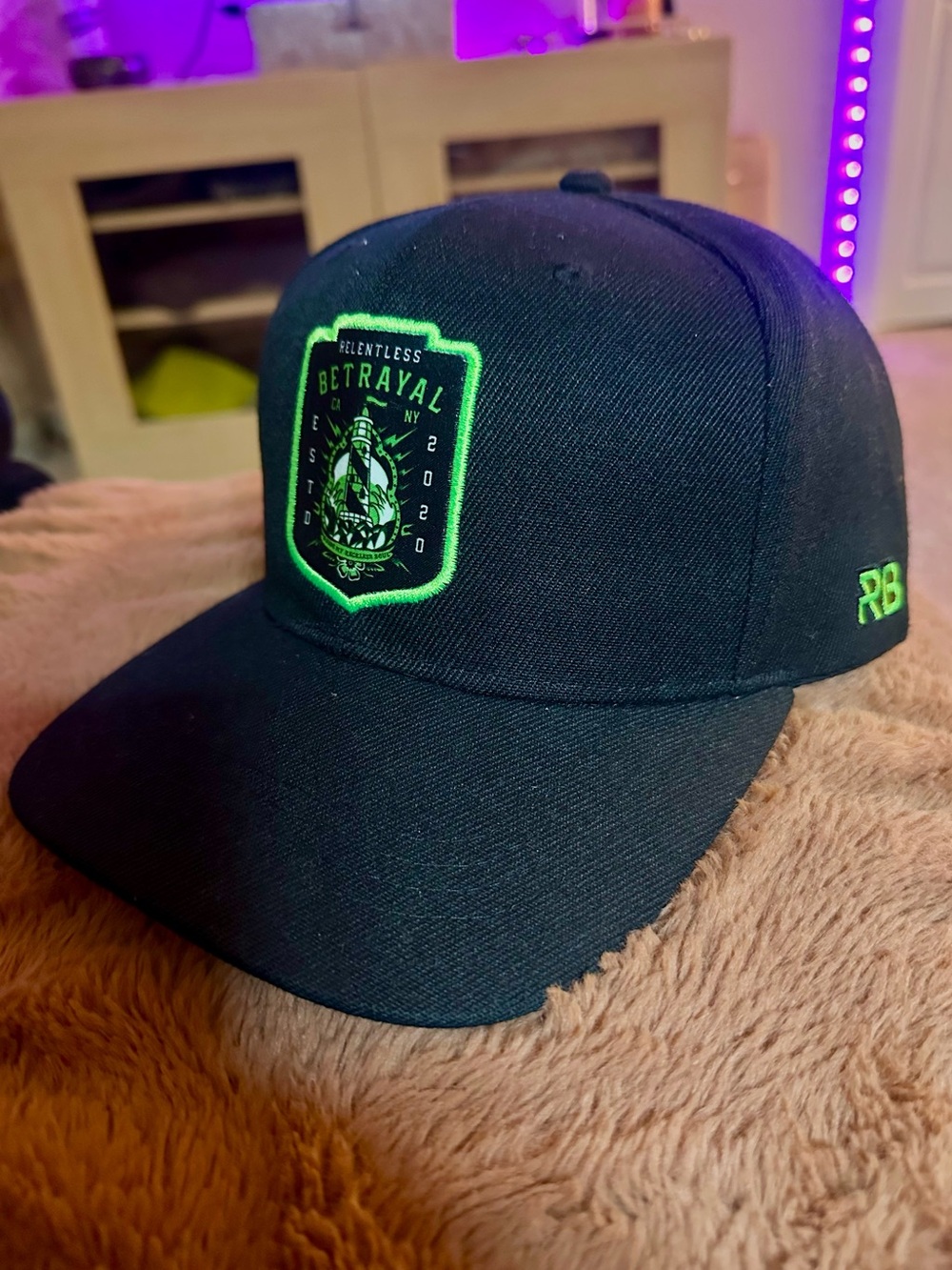 Relentless Betrayal Black Snapback Hat with Neon Green